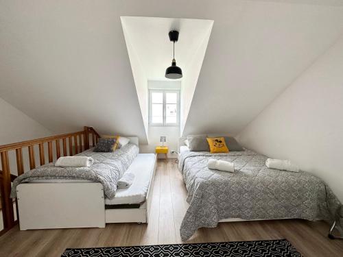 En eller flere senge i et værelse på Appartement 2 chambres