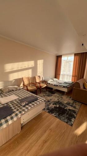 Una cama o camas en una habitación de Apartment Bosteri Beach