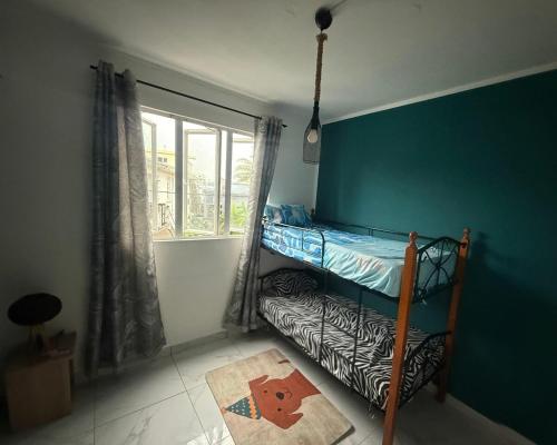 The Reset في غراند بايَ: غرفة نوم مع سرير بطابقين ونافذة