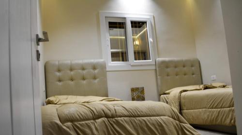 Ένα ή περισσότερα κρεβάτια σε δωμάτιο στο Chalet Sultan Ajloun