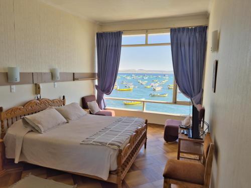 Postel nebo postele na pokoji v ubytování Hotel Panoramico