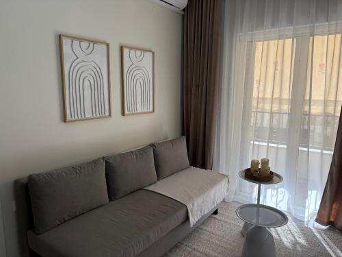 Ein Sitzbereich in der Unterkunft Symposio Apartments 3