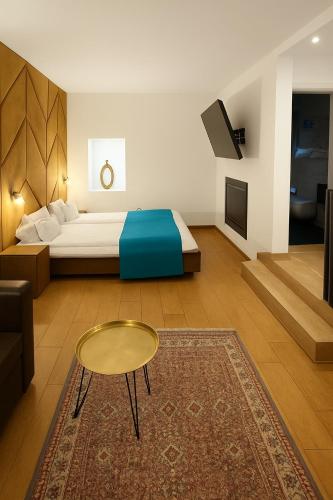 Postel nebo postele na pokoji v ubytování Hotel-Restaurant Kriva Ćuprija