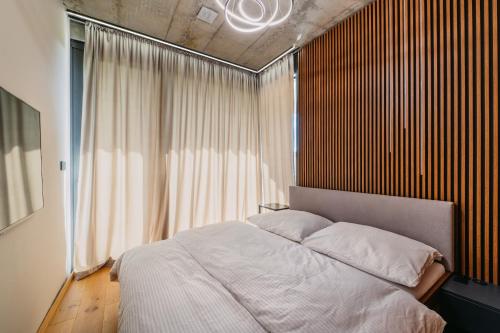 En eller flere senge i et værelse på LaResidencia Rajecké Teplice