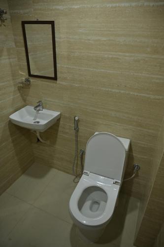 Koupelna v ubytování Hotel Satyabhama Lodge