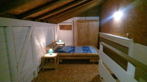 Ένα ή περισσότερα κρεβάτια σε δωμάτιο στο SLEMAN Franck