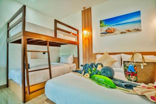 Postel nebo postele na pokoji v ubytování The Holiday Garden View