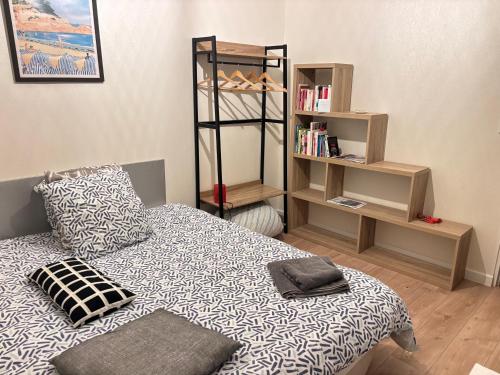 Ένα ή περισσότερα κρεβάτια σε δωμάτιο στο La Maison du Bonheur