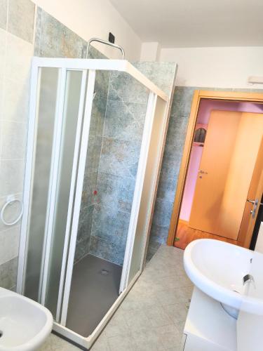 a bathroom with a shower and a sink at Cà Fortunato in Capriate San Gervasio