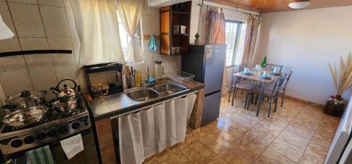 Kuchyň nebo kuchyňský kout v ubytování Casa Maxima