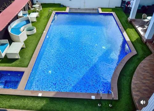 Πισίνα στο ή κοντά στο de brit hotel