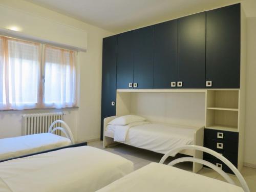 Postel nebo postele na pokoji v ubytování Lily House