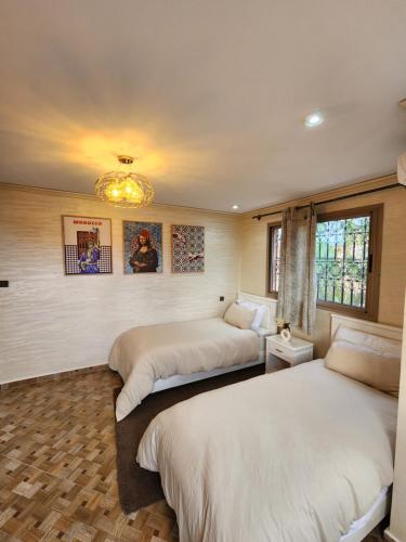 Postel nebo postele na pokoji v ubytování Residence Imlil Ouarzazate