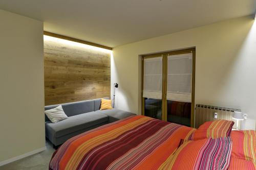 Postel nebo postele na pokoji v ubytování Le Reve de Marisa