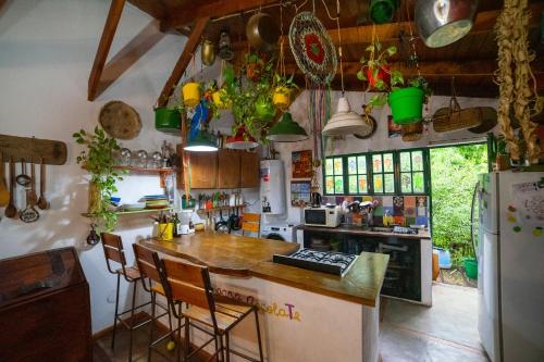 Køkken eller tekøkken på Habitación doble con balcón y pileta en las sierras Unquillo