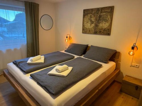 Una cama o camas en una habitación de Apart Lisa