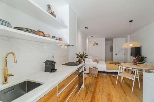 Køkken eller tekøkken på Ajuda Cozy Retreat with Patio