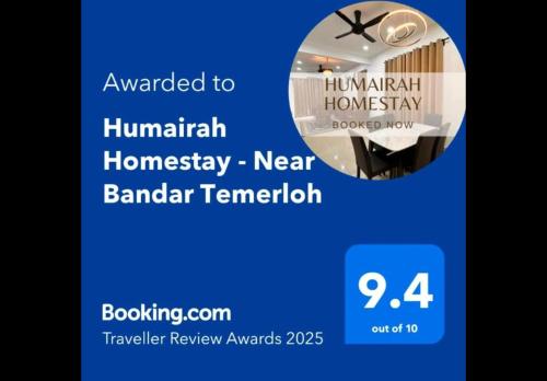Certificado, premio, señal o documento que está expuesto en Humairah Homestay - New House Near Bandar Temerloh