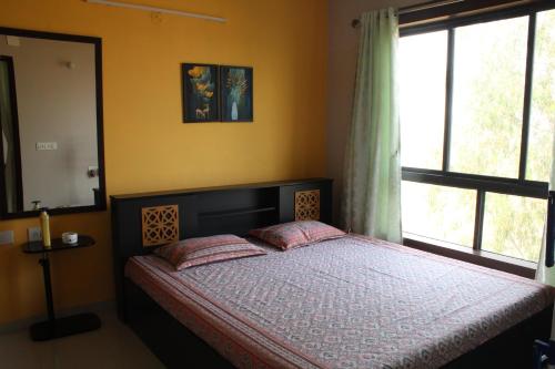 En eller flere senge i et værelse på The City Escape