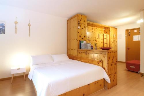 Postel nebo postele na pokoji v ubytování PILA: Mono Condominio G7 - Fun in Paradise