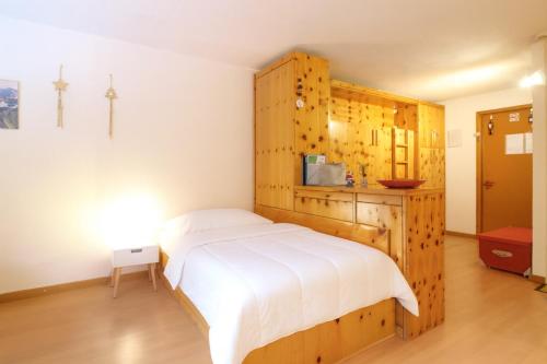 Postel nebo postele na pokoji v ubytování PILA: Mono Condominio G7 - Fun in Paradise