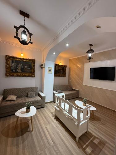 TV a/nebo společenská místnost v ubytování Marcos Apartments I Bathtub in Bedroom experience