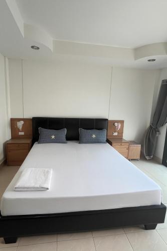 En eller flere senge i et værelse på Smile room 21