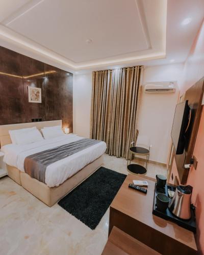 Ένα ή περισσότερα κρεβάτια σε δωμάτιο στο Covchil Executive Guest House