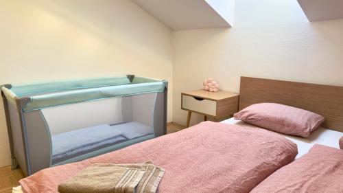 Ένα ή περισσότερα κρεβάτια σε δωμάτιο στο Stiglitzer Apartment