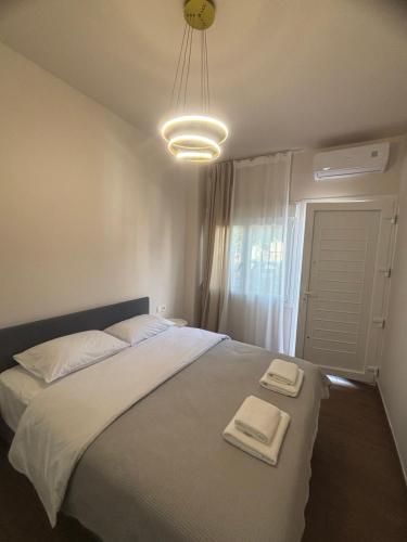 Postel nebo postele na pokoji v ubytování Storks apartments