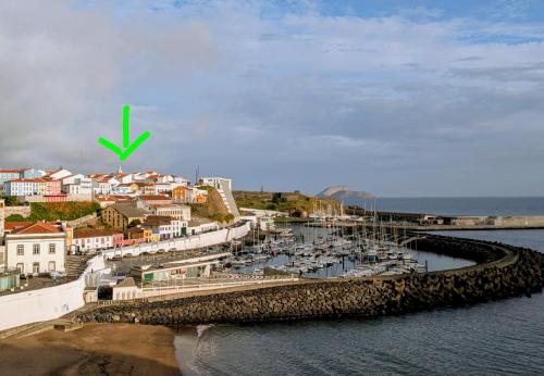 a view of a harbor with boats in the water at Downtown Guesthouse in Angra do Heroísmo