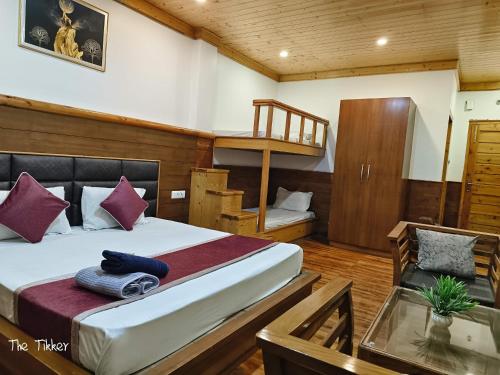 Postel nebo postele na pokoji v ubytování 3 BH Apartment with Huge living area and with private balcony and open area By The Tikker