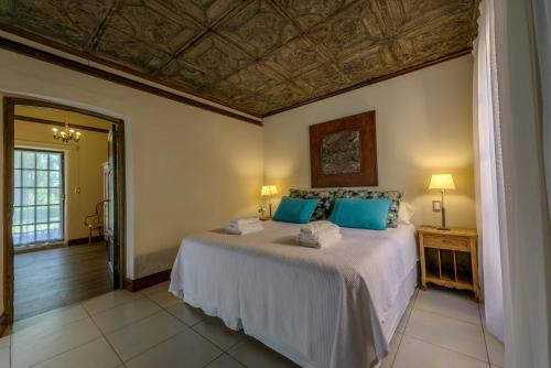 Postel nebo postele na pokoji v ubytování Posada Verde Oliva