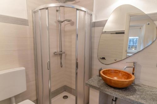 Et badeværelse på LA PERLA piccolo appartamento in piazza