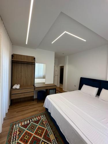 Ένα ή περισσότερα κρεβάτια σε δωμάτιο στο Hotel Celiku