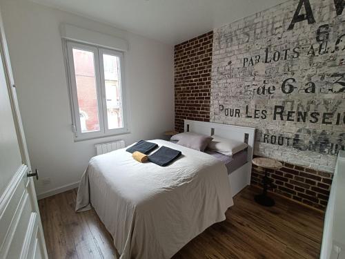 Postel nebo postele na pokoji v ubytování 04- La Potinière- Proche Plage - RDC avec Terrasse- Parking gratuit