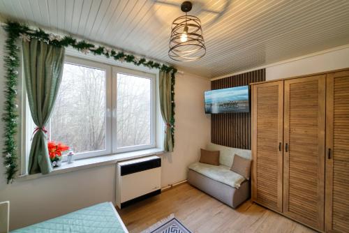 Giường trong phòng chung tại Byt pri lese - pár krokov od Hrebienka