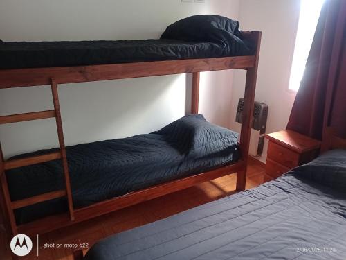 En eller flere senge i et værelse på Complejo Don Joaquin 1