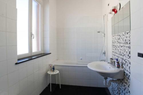 A bathroom at Sunflower Apartment with private terrace and lift
