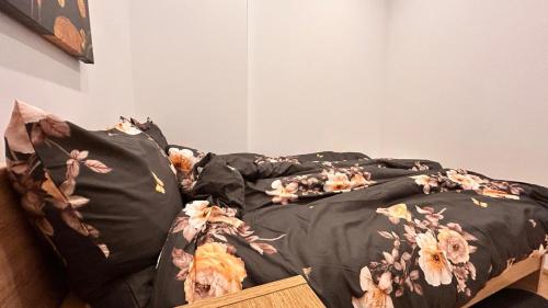 En eller flere senge i et værelse på Miodowy apartament