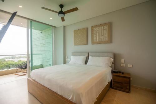 En eller flere senge i et værelse på 2BR for 8 guests with views in Baru