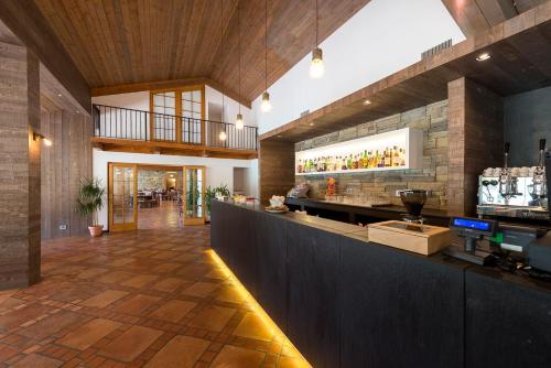 a restaurant with a bar in a room at Hotel Don Luis in Castel di Sangro