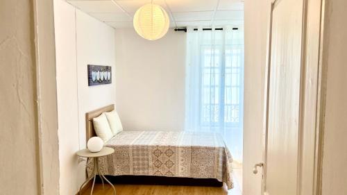 En eller flere senge i et værelse på Jardim das Flores