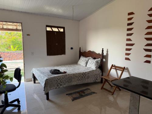 Ένα ή περισσότερα κρεβάτια σε δωμάτιο στο Pousada Maré Alta em Boipeba