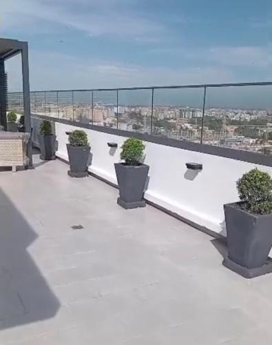 En balkon eller terrasse på Superbe appartement residence Kalia Front de terre