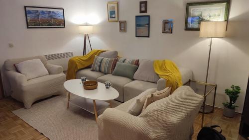 Ein Sitzbereich in der Unterkunft Garden House