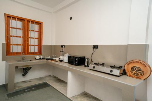 Kuchyň nebo kuchyňský kout v ubytování Villa Balcony Bliss