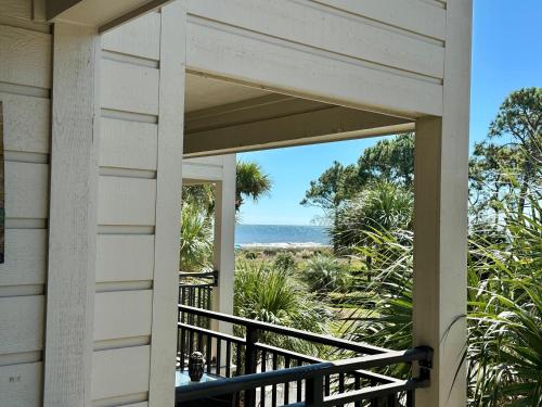 a view of the beach from the porch of a house at Seaside 278 in Hilton Head Island