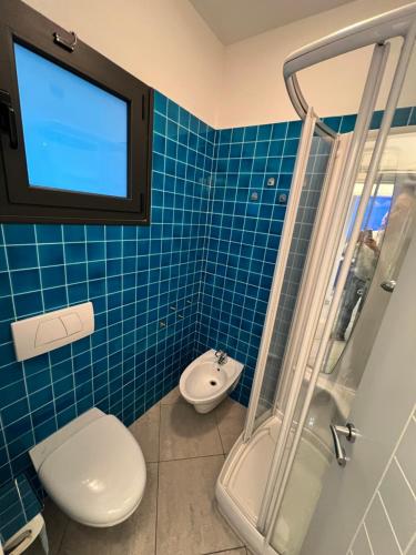 Ένα μπάνιο στο Palm Grove House