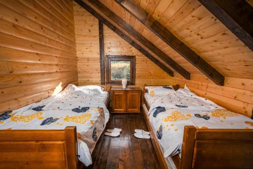 En eller flere senge i et værelse på Gorski Mir